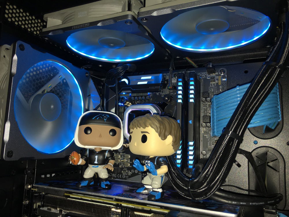 Cam Newton and Luke Kuechly Funko Pops and Phanteks RGB frames.