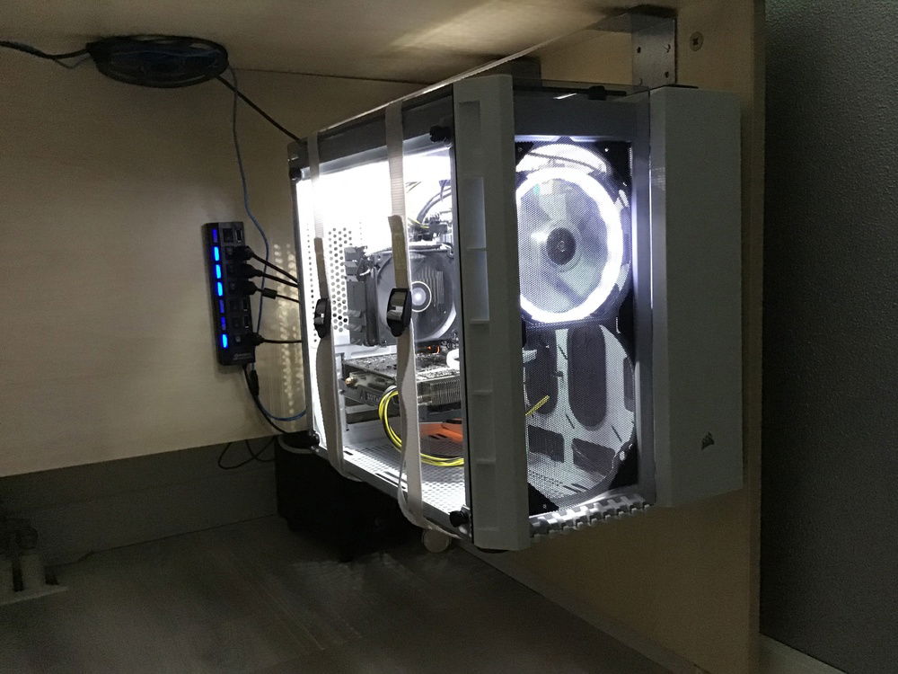 I got my pc hanging under my desk, pretty chill