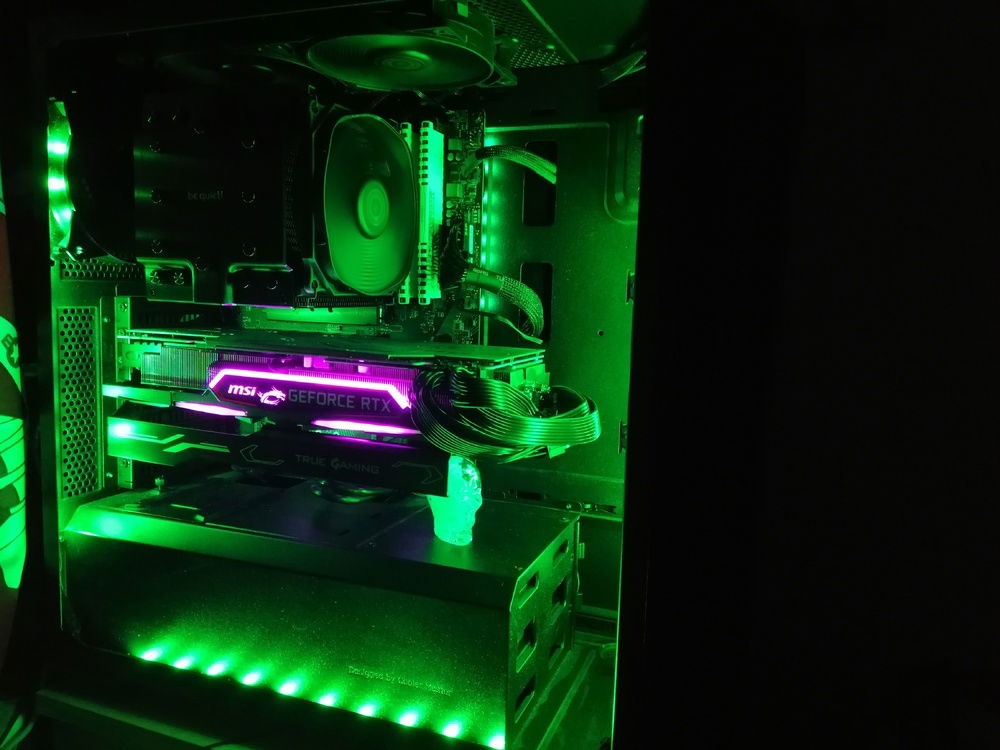 Better quality picture, making the rats nest of cables for the GPU really stand out XD.