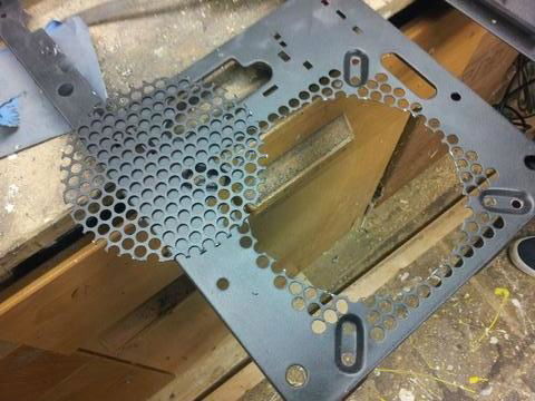 I removed the front mesh for improved airflow.  There is already a mesh in the front of the case.