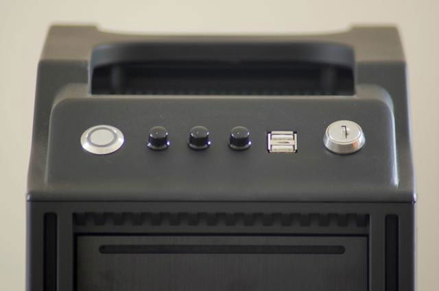 Reworked front panel.  Momentary anti-vandal white LED power switch, 3-channel fan controller, 2xUSB 2.0, and a key switch (wired in series with the power switch)