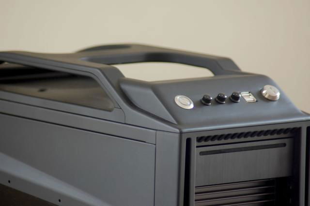 Reworked front panel.  Momentary anti-vandal white LED power switch, 3-channel fan controller, 2xUSB 2.0, and a key switch (wired in series with the power switch)