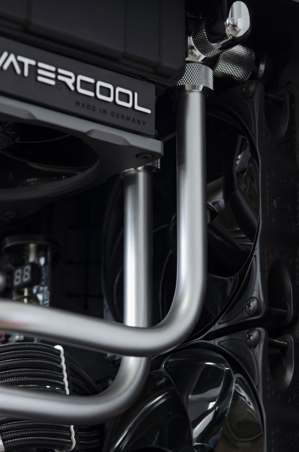 Watercool logo was milled, anodized and then milled again. The black anodized part perfectly blends in with radiator.