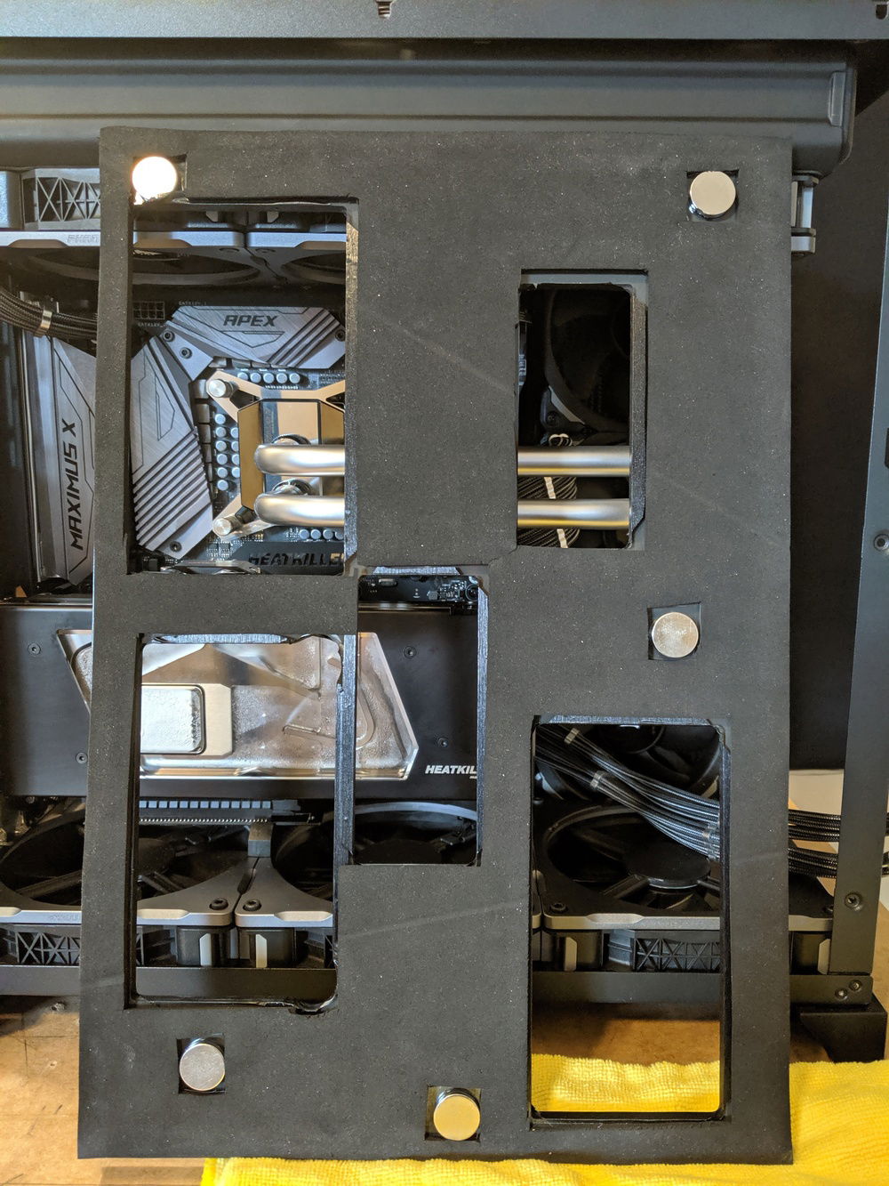 Back side of rear case cover. Neoprene and magnets to firmly attach to the case. Luckily you don't see this side.