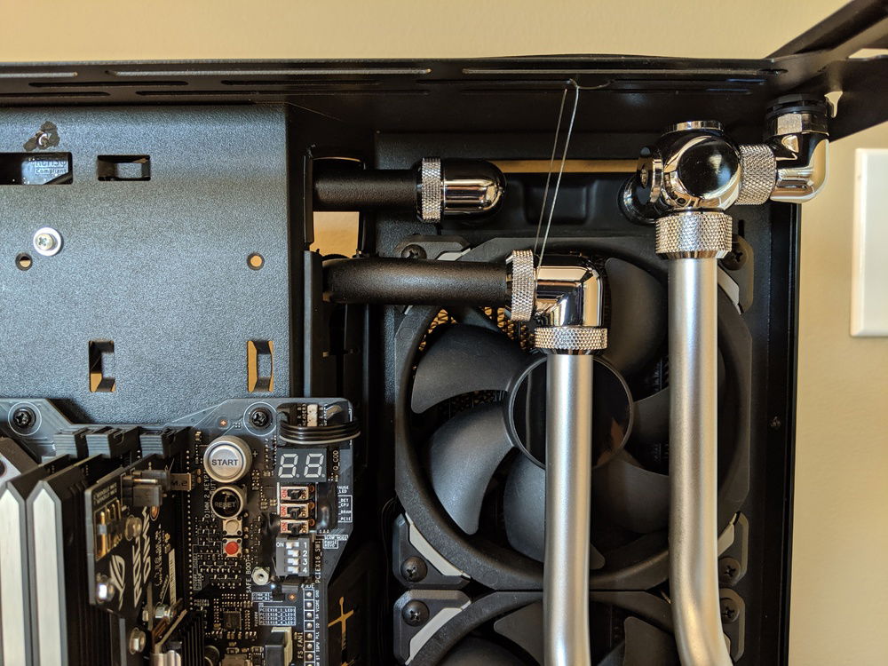 This run is so long and has so many dual compression fittings... it would collapse without some form of support. Using fishing line also let me finely adjust the position of that tube run to get it flush with the other run.