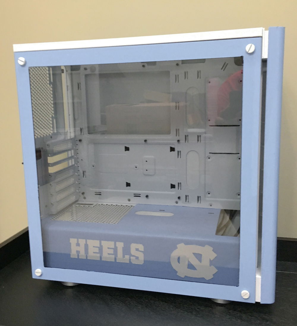 Modded case with custom white grommets made with food-grade silicone rubber and Seal-All contact adhesive (as you apparently can't paint rubber white)