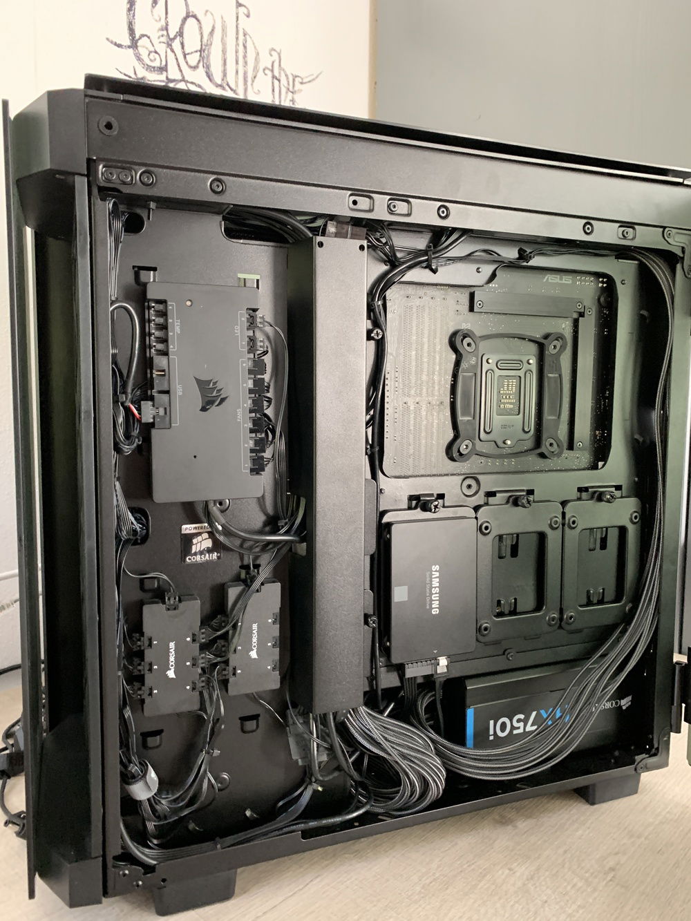 Cableside of the pc with my lighting controllers and SSD.