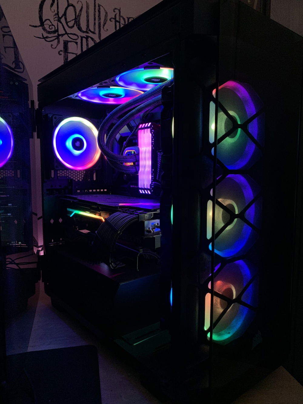 Pc with side door open and a full RGB setting.
