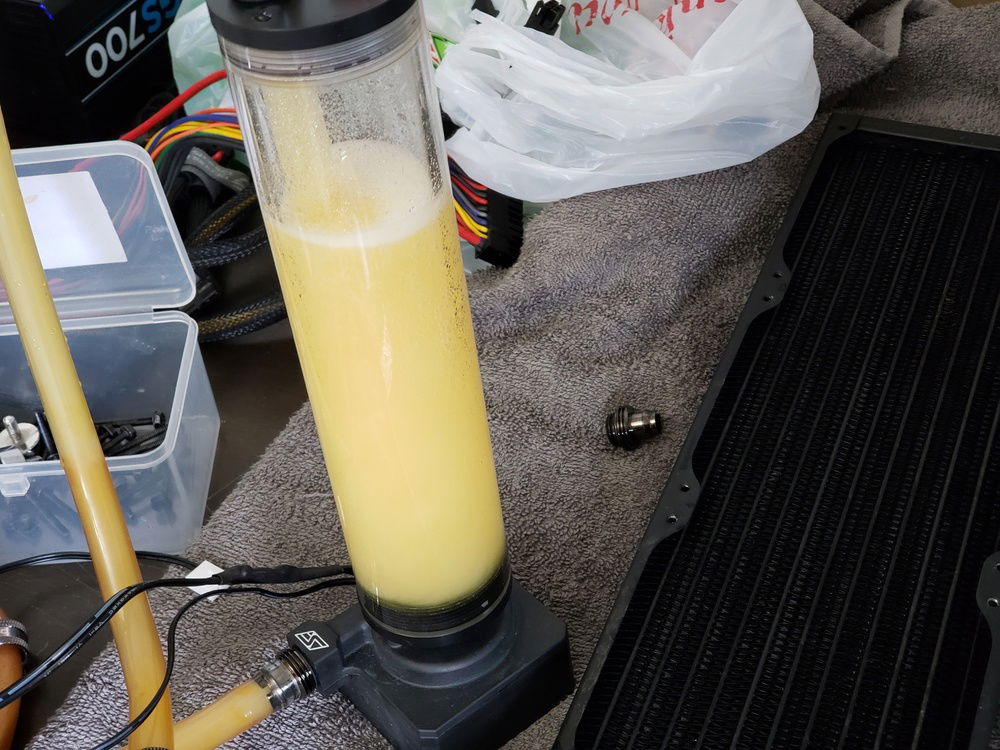 It took about 6 gallons of water and 2 hours to get this radiator clean. Used a swiftech pump and a backup res for a temporary loop to clean out the rad.