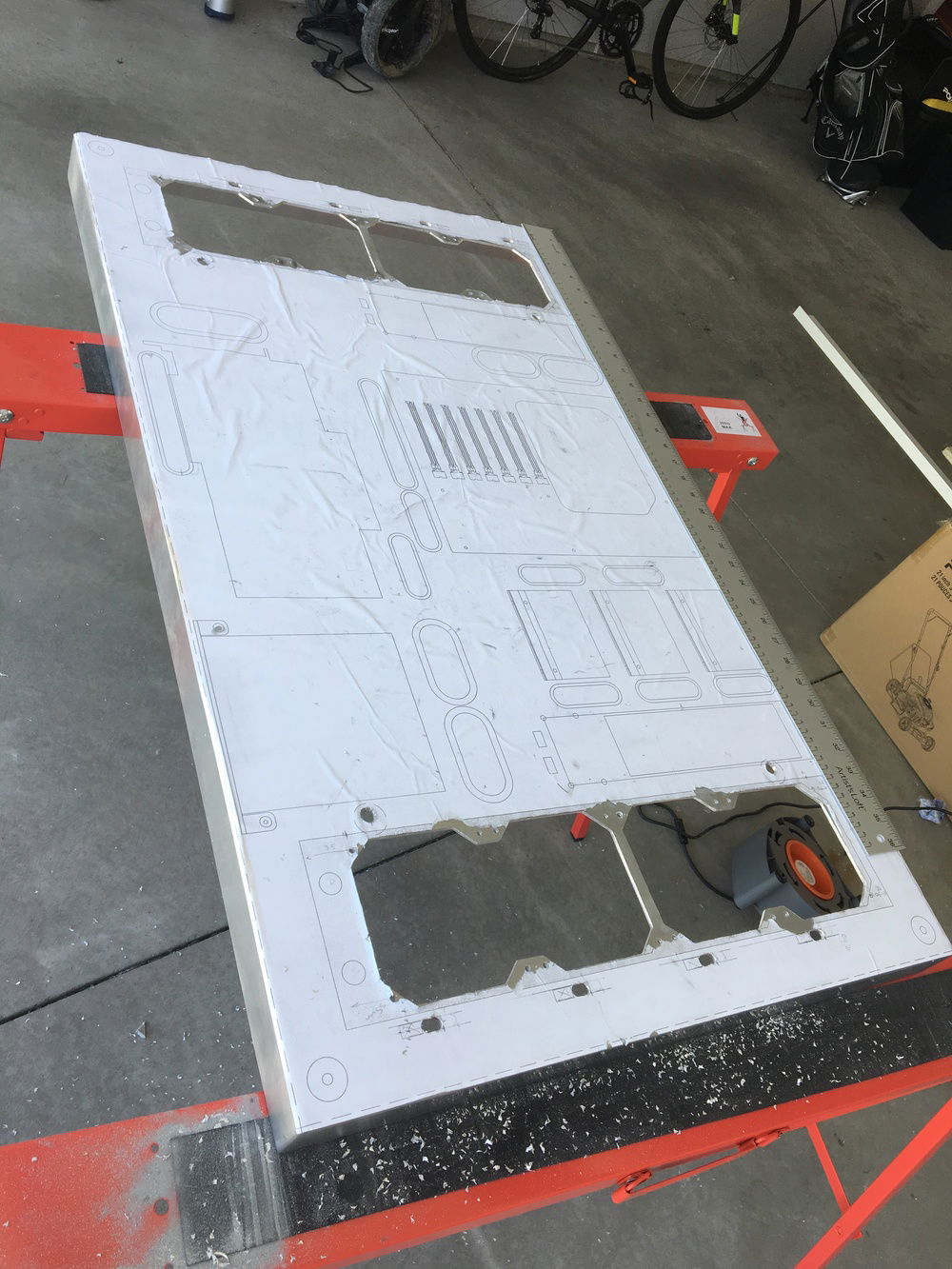 Radiators #1 and #2 cut-outs done.  Holes were cut using a grinder, hand saw, and drill.  Then, edges were filed and sanded smooth.