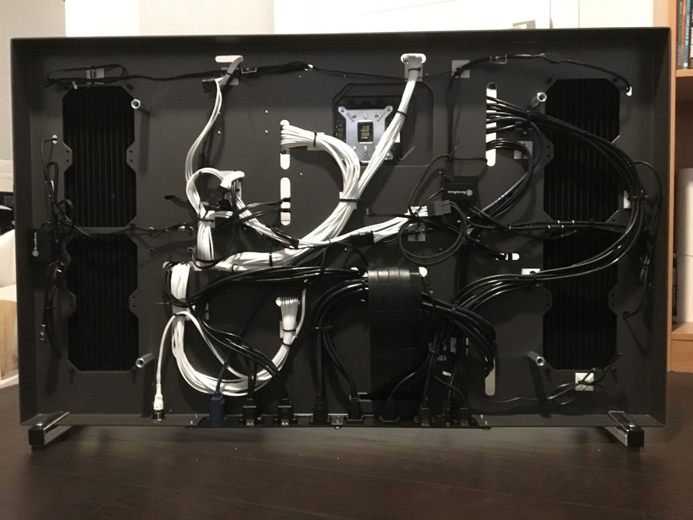 Cable Management, with the rear panel removed.  You can see the many I/O panel cables routed to the bottom for easy access once installed.