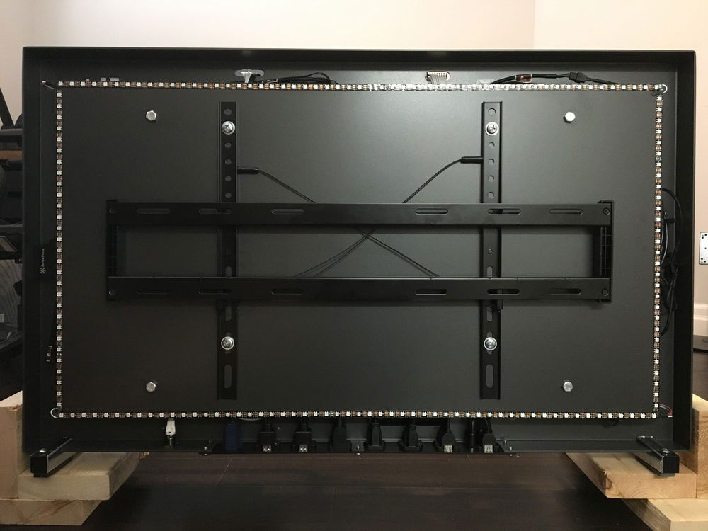 Rear panel, with the VESA wall mount and RGB back-light configuration shown