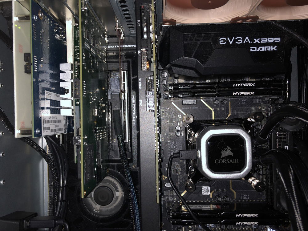 That U.2 adapter taking up an expansion slot shouldn't be necessary, but I haven't got the second onboard port working yet. This motherboard doesn't have PLX chips like my other build, so some rearrangement of parts and BIOS settings is required to get that working.