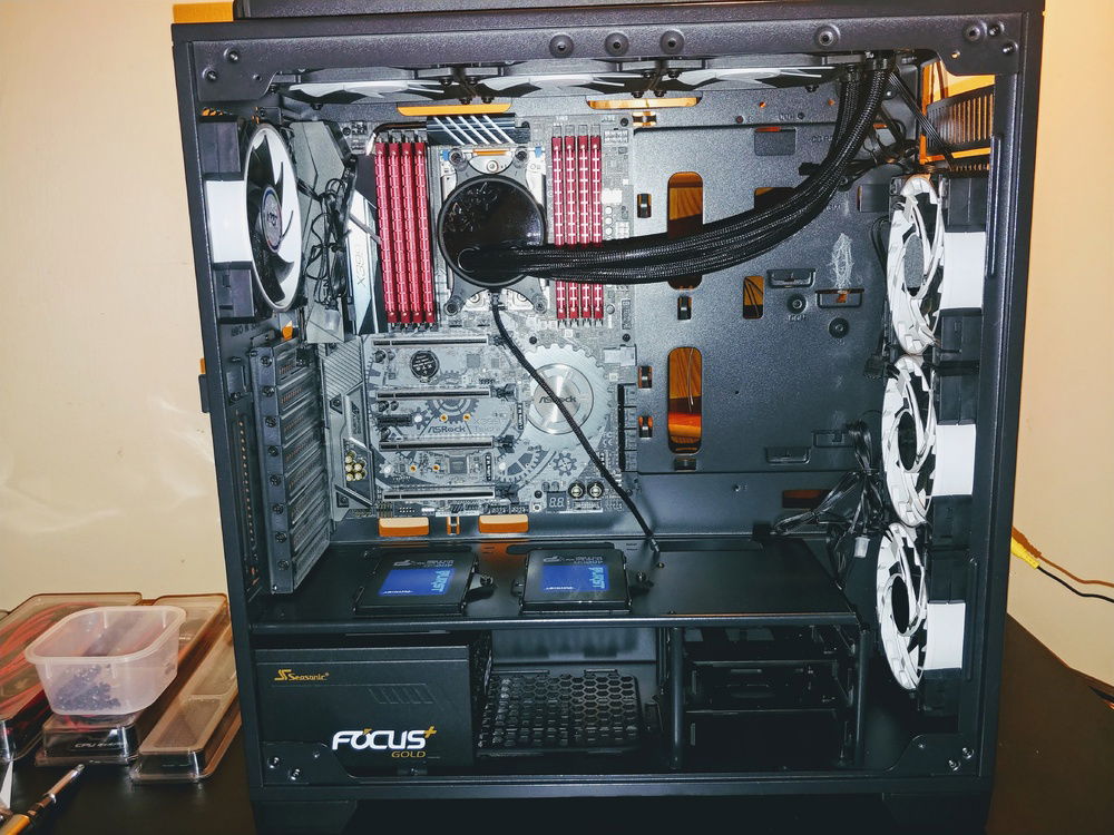 Placing SSD'S. The 2TB SSHD is hidden by the back panel.