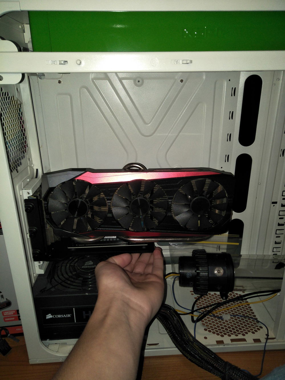Test fitting the vertical GPU mount I got. Definitely need to make some mods to the case.