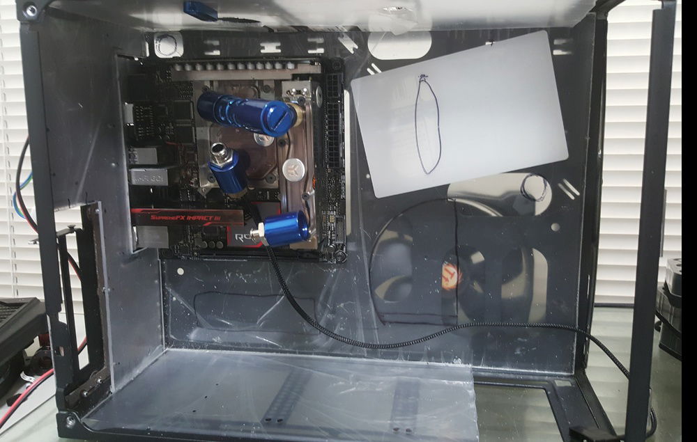 Interior panels cut to fit, and marked for holes. Tje marks are sloppy because I was just roughing things out inside the case before pulling the panels out and making more precise marks.