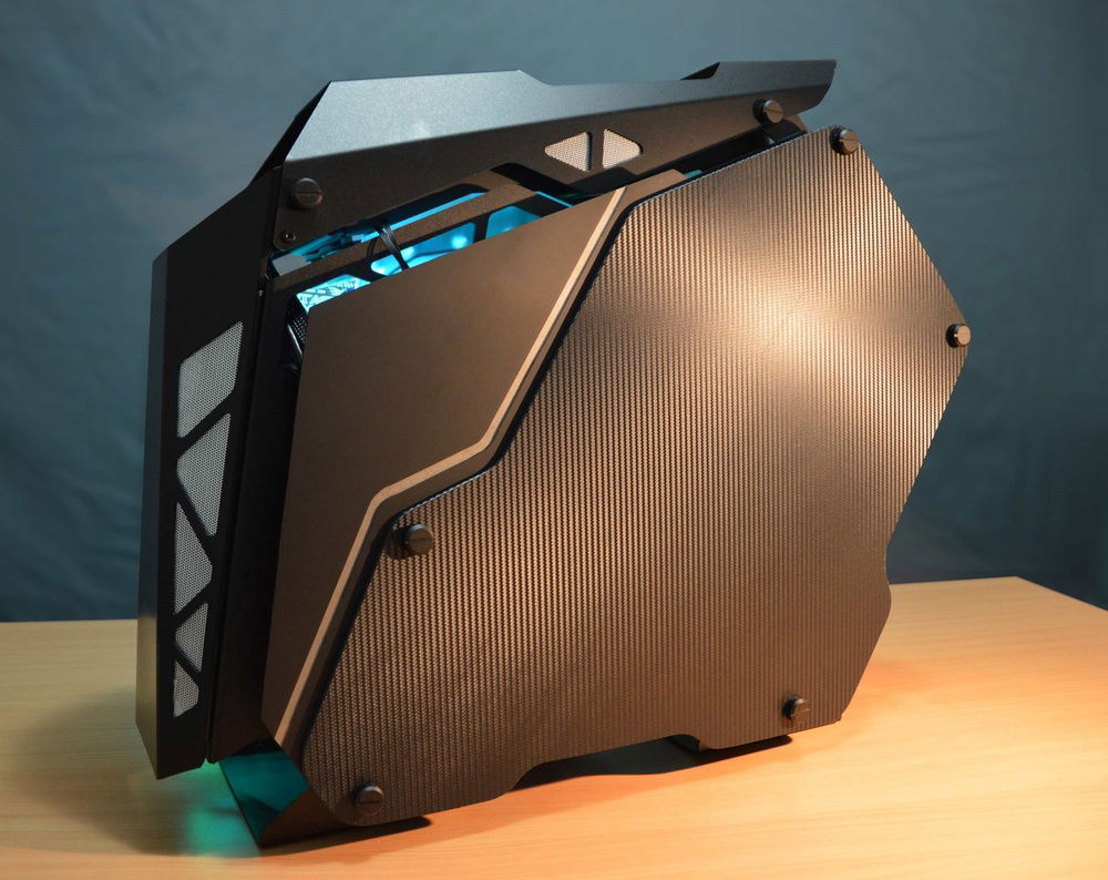 the stock glass panel was wrapped in carbon, then i made a custom panel out of acrylic to extend the glass one so it would cover all the cables