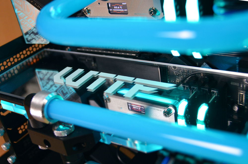 custom, handmade gpu backplate. WTTF is the name of the clients company. its just mirrored acrylic with a design painted on top