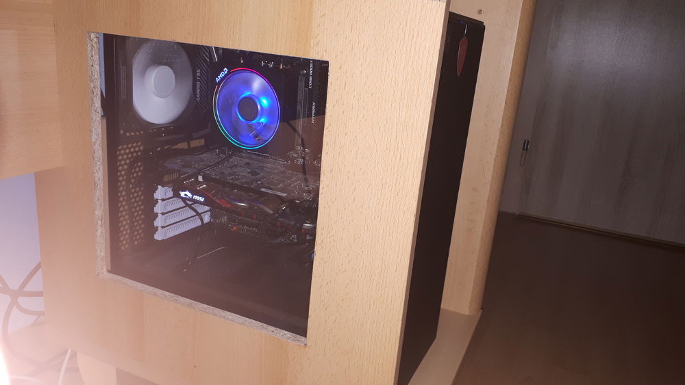 In the old table, i used to have the PC there but eventually i moved it next to the table due to poor airflow.