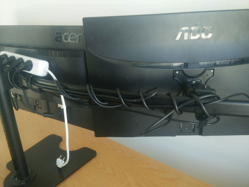 All the monitors is powered through that one extension cord keeping it compact and simple.