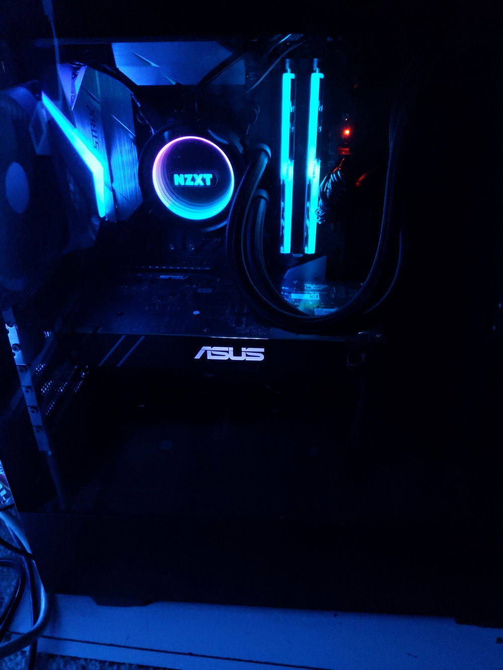 My view through the side panel. Love the two SSD holders that come with this case.