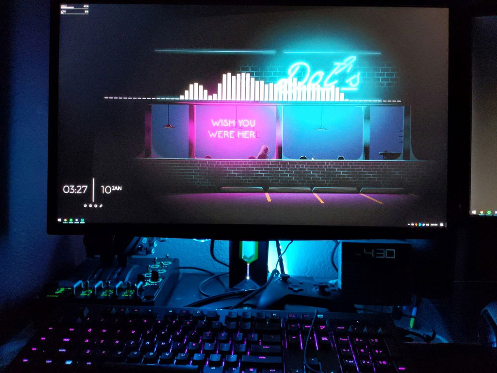 My view from my chair. I have x56 stick and throttle that I keep off the side of my mousepad and behind my monitor when I'm not using them.