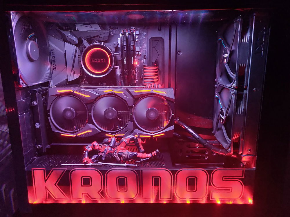 In the dark with etched TG panel.
Sorry that my phone cant take a good picture of it in the dark with lights on. In irl it looks much better. 
Only parts that are red in irl are the etch on the glass (much more subtle), and lights on gpu and aio + sleeved cables.
Otherwise its black with little bit of white light shining on components.