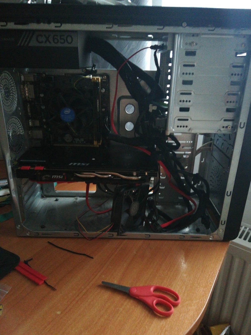 Getting rid of the HDD cage to make the GPU fit.