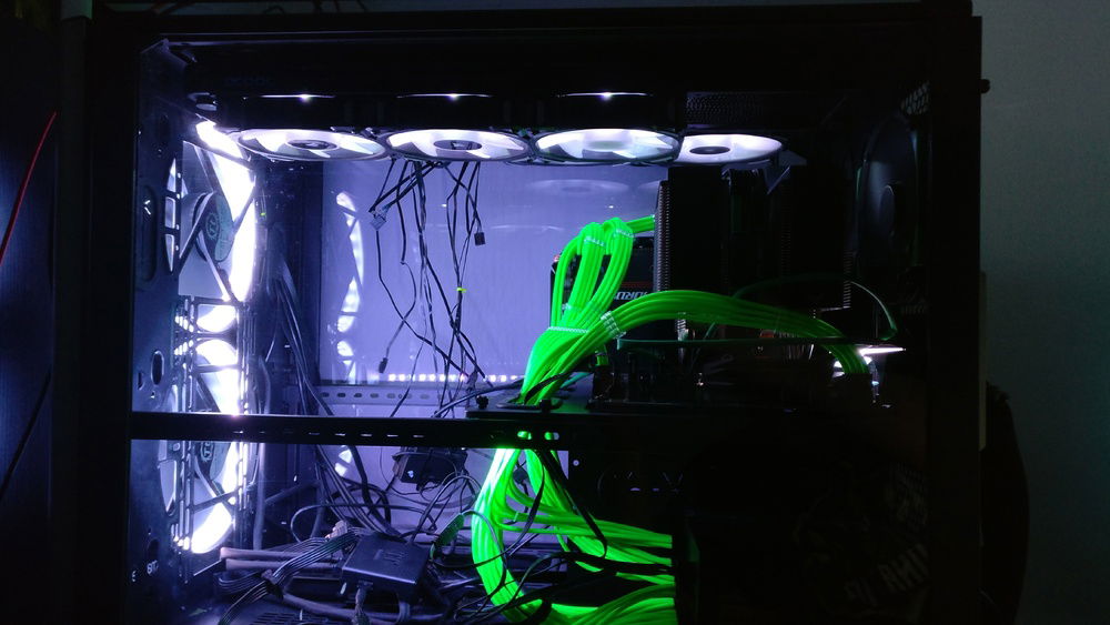 Sideshot with current state, using white lights to better illuminate insides.
I'll be covering the bottom half with acryl plate with custom graphics on it. Wondering about placement on Pump/res combo, should I close the "top" side of it too or not and make holes for reservoir/tubing on acryl?