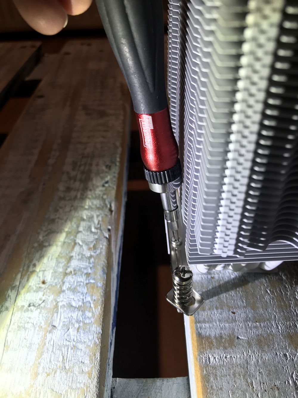 Similar to the large screw driver a small precision ratchet won’t get you close enough to sit true on the screw