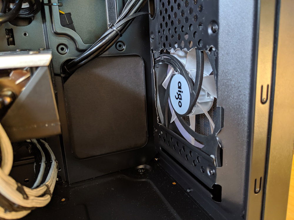 A high quality case mod. I also had to remove a 3.5" HDD cage from the lower front to fit the GPU.