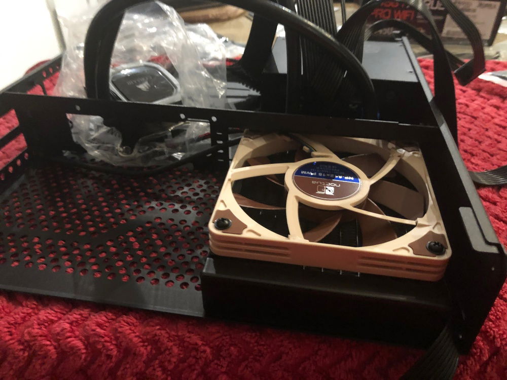 Here you can see the full AIO assembly with the GPU power cable nicely routed between case and radiator.