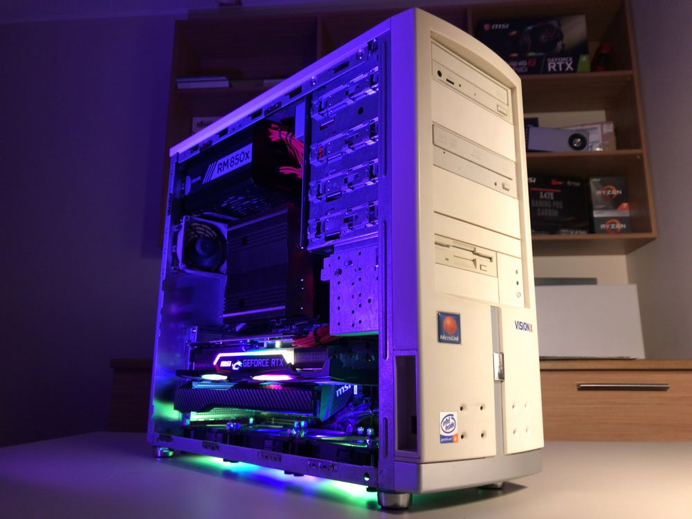 Side view, with the previous RMx PSU