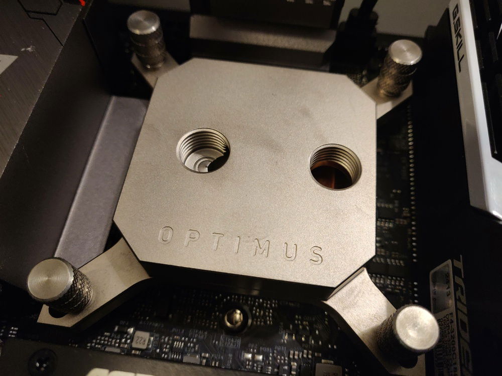 The Optimus V2 Signature water block is installed.