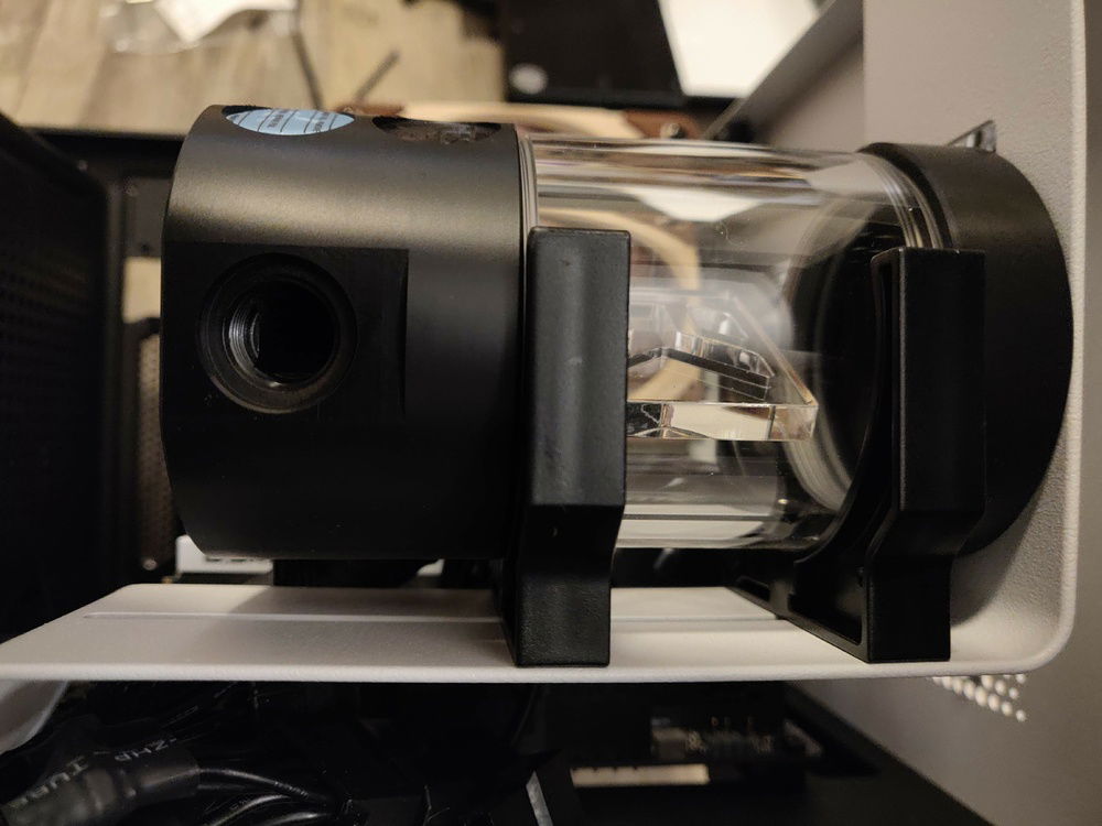 The stand alone reservoir comes with two holders that screw into the reservoir holder that came with the case.