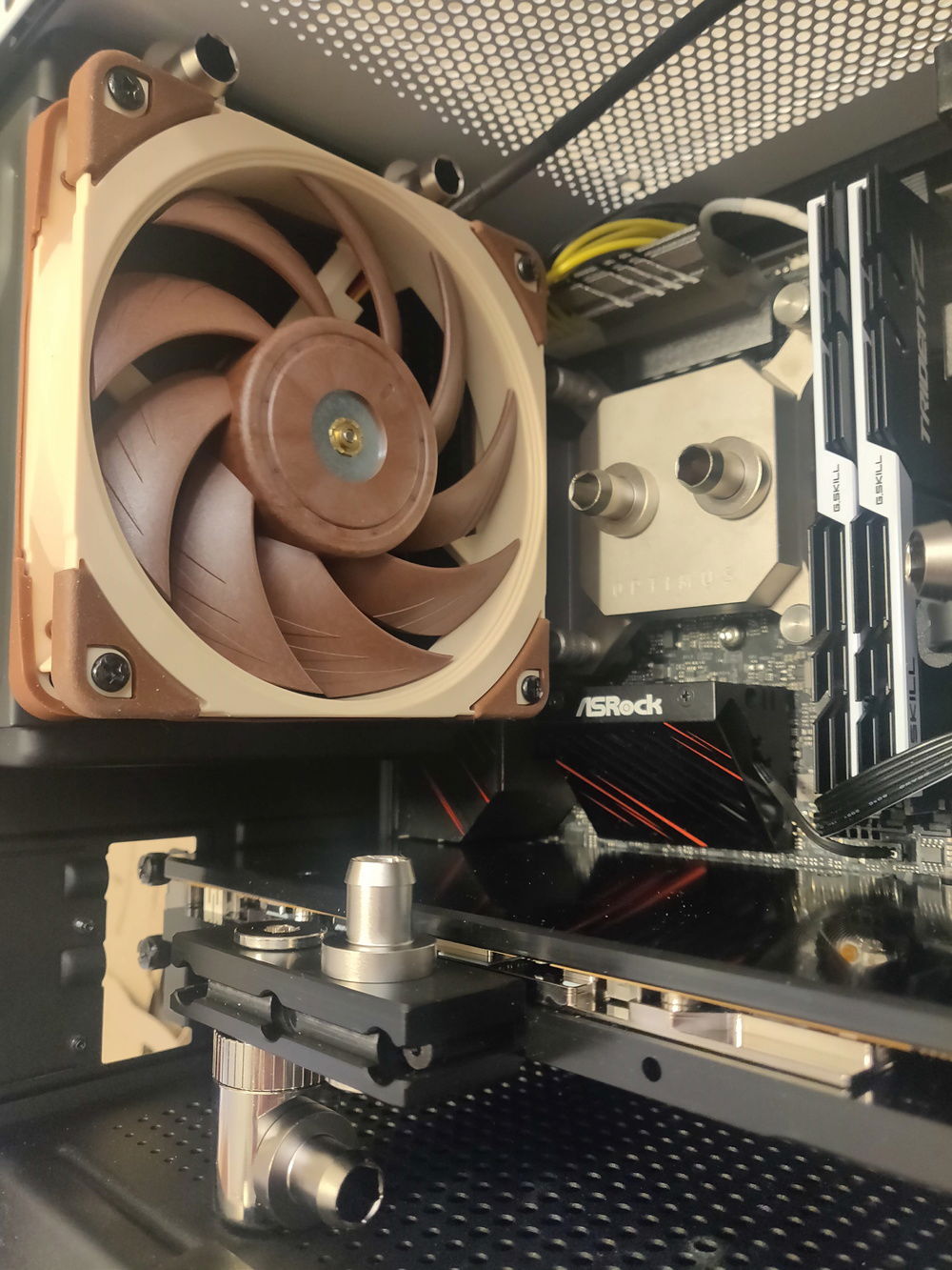 I turned the 120mm radiator upside-down so that the connections are on top.