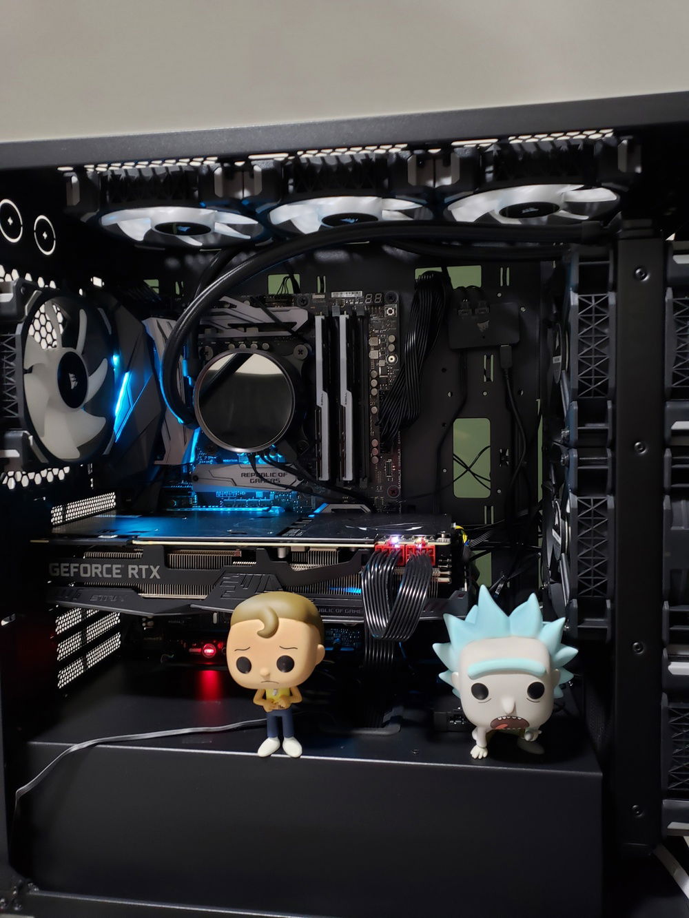Lights on with the side panel removed so you can see all the components. All the RGB fans made cable management a little challenging but I got it all wrapped up as cleanly as possible.