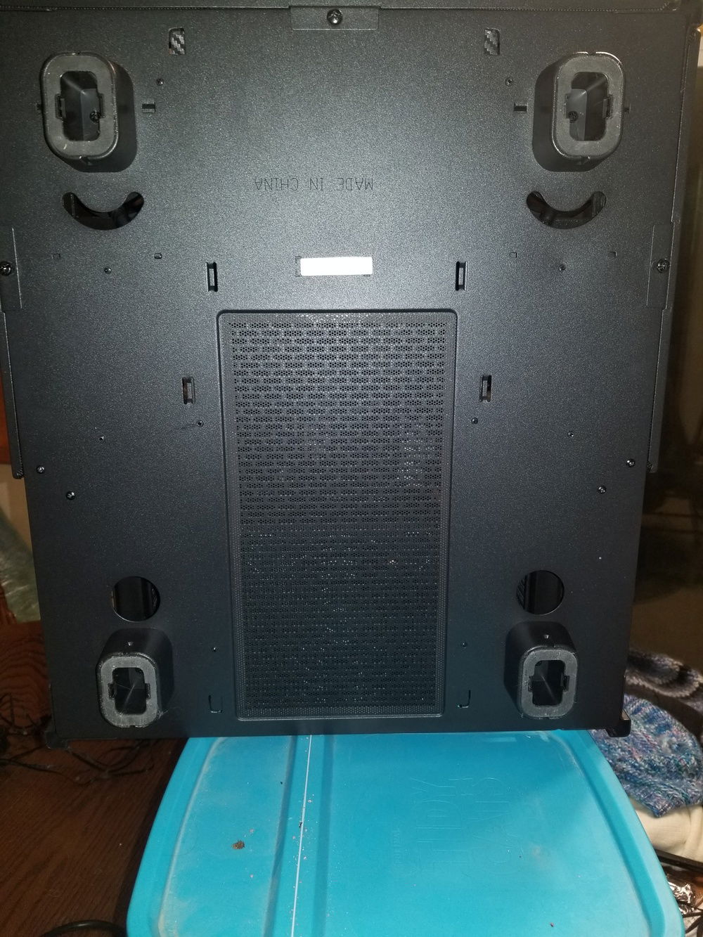I discovered there is a dust screen on the bottom of the case for the PSU and front hard drive cage fans.