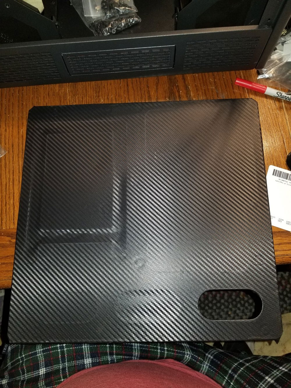 Vinyl wrapping on the motherboard tray started now that initial component testing checked out.