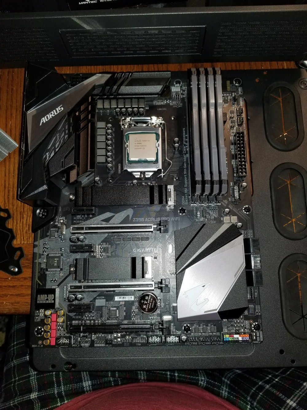 Motherboard mounted up and just about ready to go back in.
