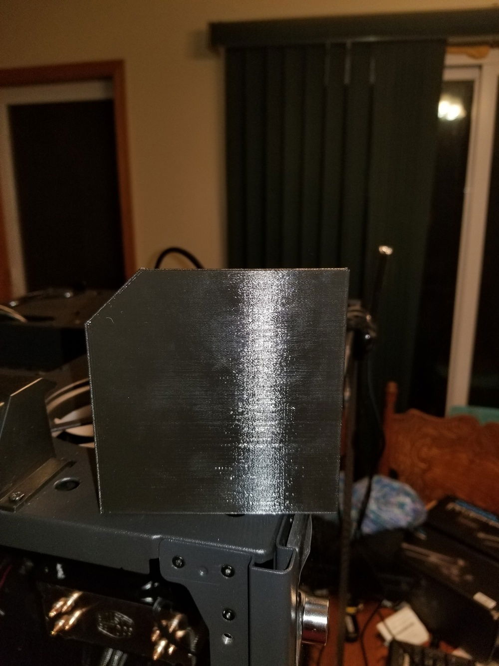 Angled on the front face to match the metal case trim.