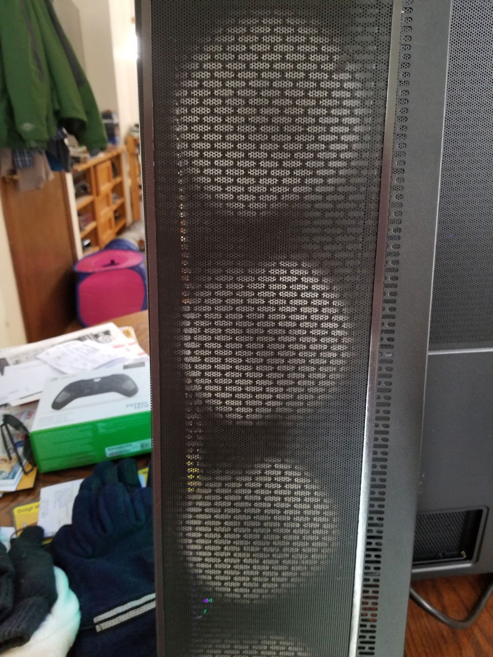 One of the side dust screens after about a month of moderate use.  My house isn't crazy dusty or dirty, but with this much airflow, it's going to attract every bit it can.  I'll never run a PC without dust screens again given the option.