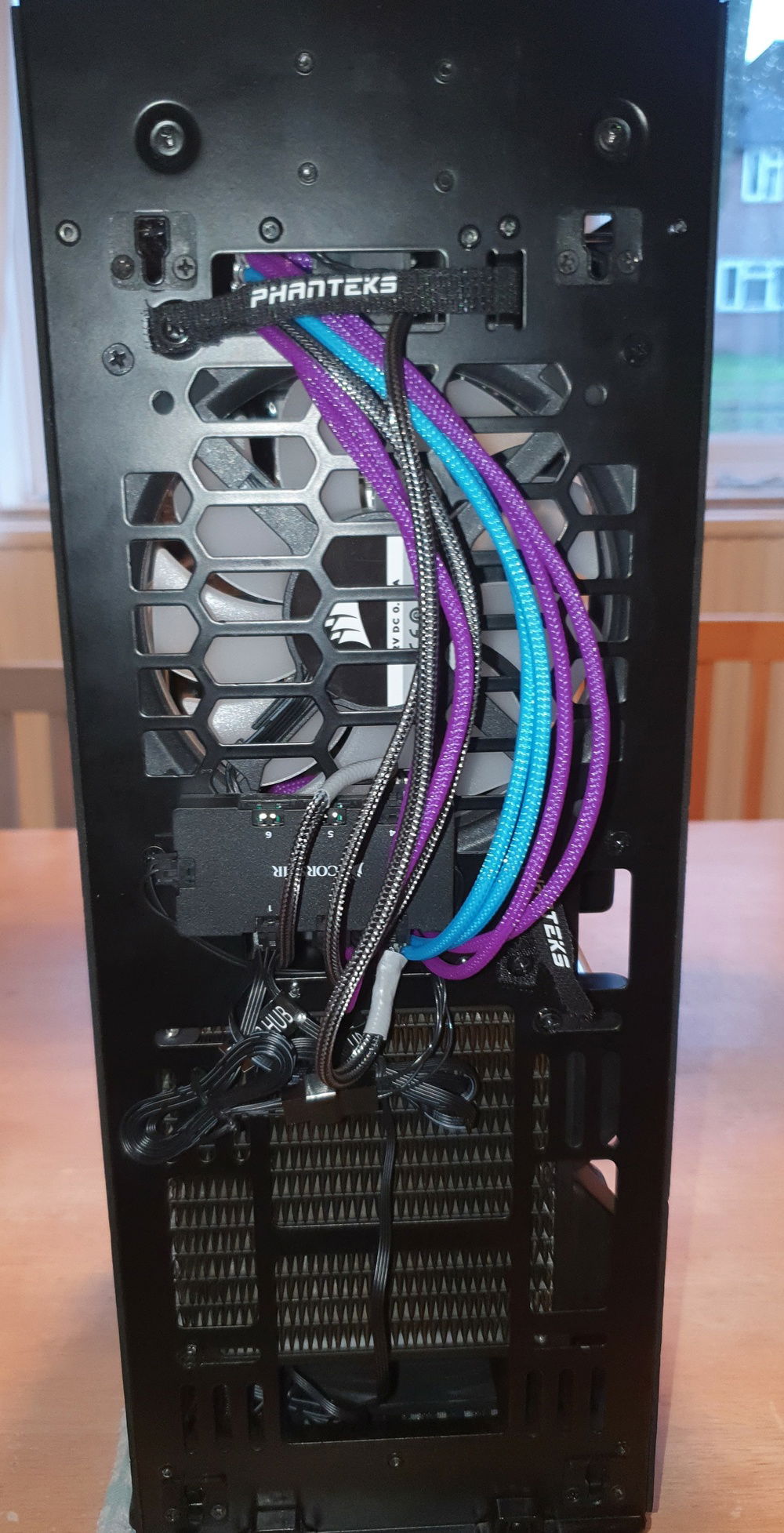 Cable Management - Intake/Exhaust Side - Cables are loose so they push from fan to side of case allowing for better airflow.