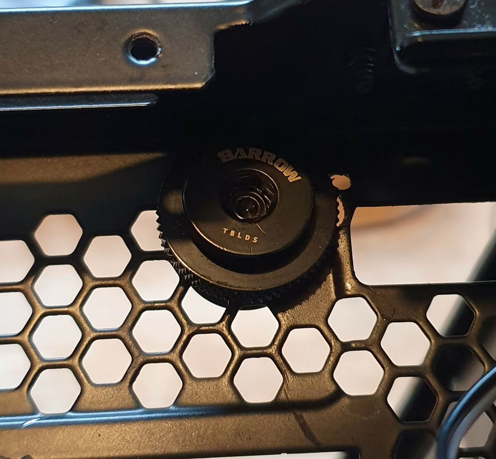 Fill Port from Top - I cut a hole in the top of the chassis and mounted a pass-through to act as a fill port.