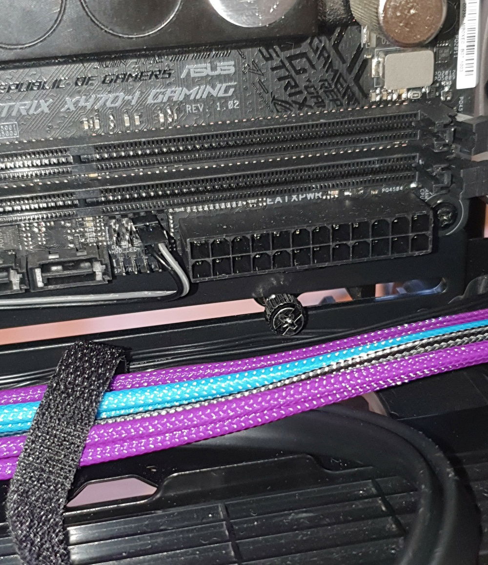 GPU Mounting Screw - Don't forget to tighten before finishing the cables in the centre channel.