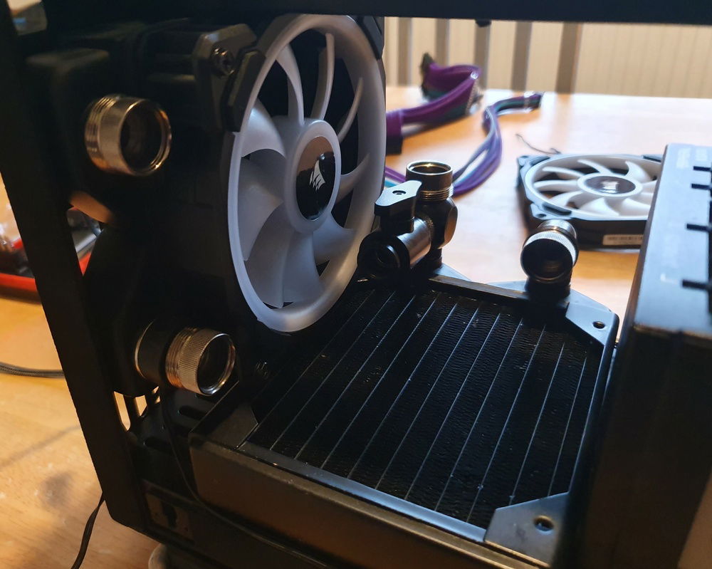 Lower Chamber - I mounted a ball valve to act as a drain port.  This has been soooo helpful.  Not only for draining, but also inverting the case and filling to bleed the loop.