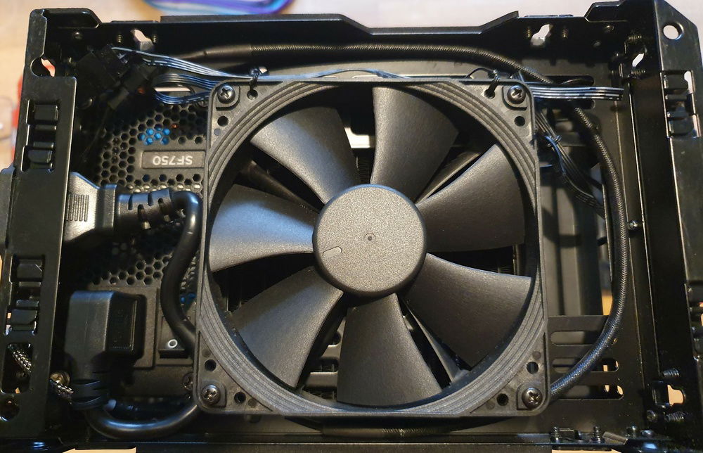 Main intake - Noctua Industrial 3000 High Pressure fan.  This is fitted to the 30FPI Rad on the bottom.  The power cable is really tightly packed in!