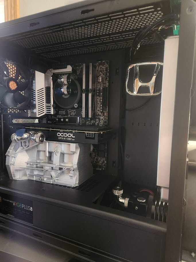 Block fits under there nicely and serves as a GPU support!