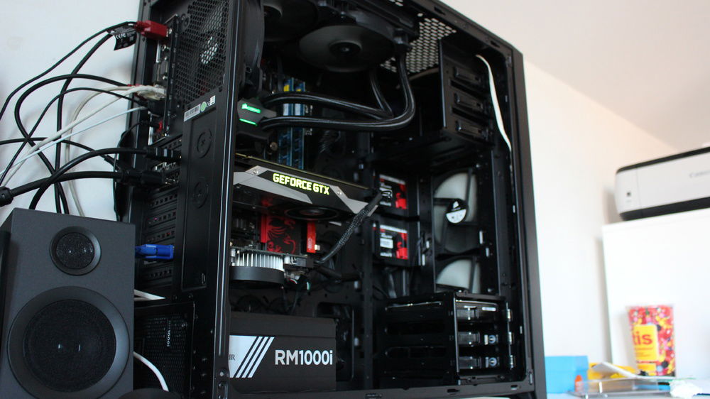 Sideshot which I really loved for a long time. Messy desk, clean rig.