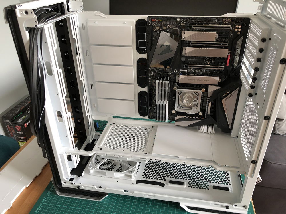 Attaching the main case part which served as a test bench back into the chassis. At this picture you can see that I´m using incorrect (original Corsair) cable instead of the CableMod one. I´ve fixed it little later.